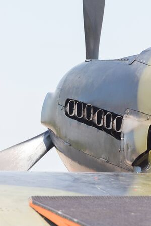 Outdoors exhibition of airplanes - A military airplane - exhaust ventsの写真素材