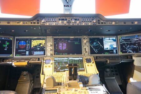 29 AUGUST 2019 MOSCOW, RUSSIA: A inside view of the dashboard in airplane pilot cabin - a lot of...