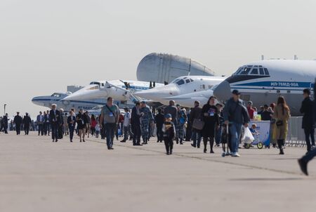 29 AUGUST 2019 MOSCOW, RUSSIA: an outdoors bussines airplane exposition - people walking and looking...