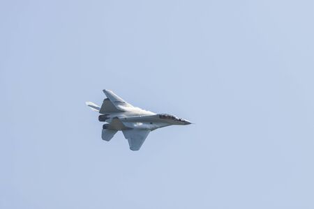 29 AUGUST 2019 MOSCOW, RUSSIA: Reactive fighter jet flying - releasing the smoke