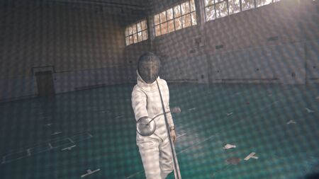 Young fencers with swords are fighting in the school gym
