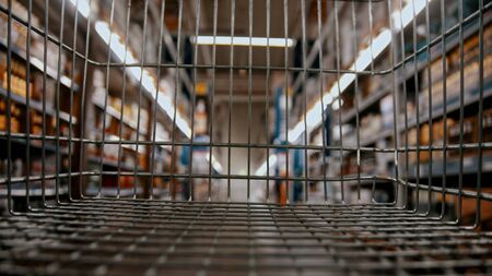 grocery basket - grocery cart in the storeの写真素材