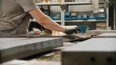 Concrete industry - washing the concrete slab with water from the special capacityの写真素材