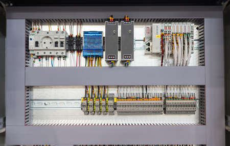 Making an electricity panel board - the inside of the panel - slots and wires