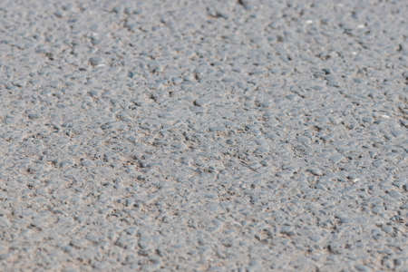 Light grey asphalt texture close up shot