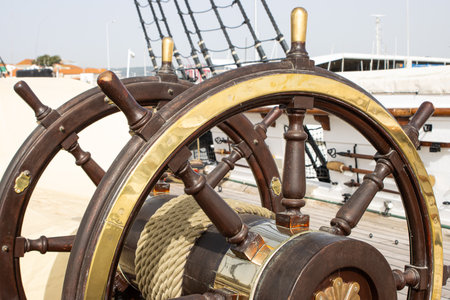 Double ships steering wheel on the old retro battleshipの写真素材