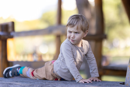 Funny little boy on playground
