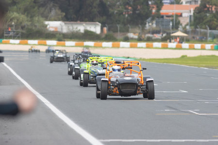 11-20-2022 PORTUGAL, LISBON: Caterham festival - racing karts driving on the track in a row