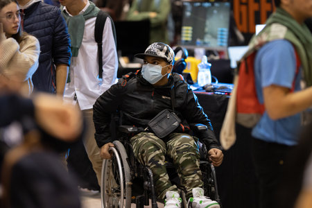 11-17-2022 LISBON, PORTUGAL - Lisboa Games Week 17 - black man in a wheelchair at the gaming...