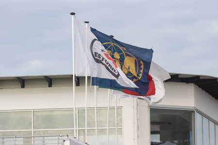 11-20-2022 PORTUGAL, LISBON: Caterham Festival Estoril - advertising flags fluttering in the windのeditorial素材