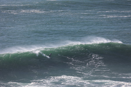 A surfer ride on sea wave