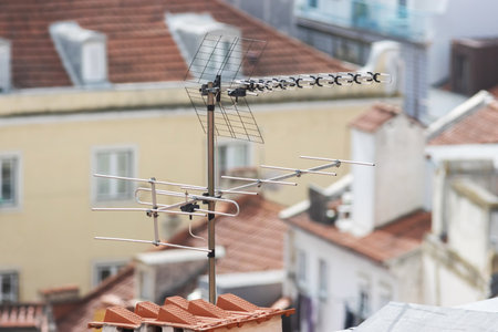 TV Antenna on the roof of a European houseの写真素材