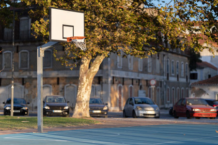 Outdoor Basketball Court at Early Sunsetの写真素材