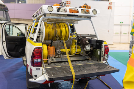 Yellow firefighting equipment with hanging partsの写真素材