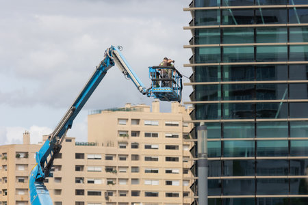 Construction site with crane in big city