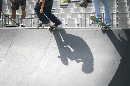 Two skaters chatting at the park.の写真素材