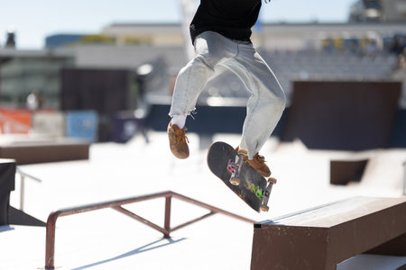 Skater balancing at the edge of a ramp