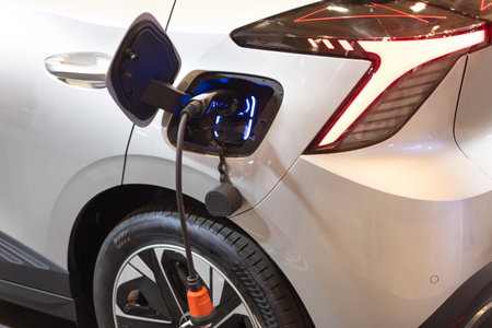 An Electric Car Charging at a Station, Embracing the Future of Transportation