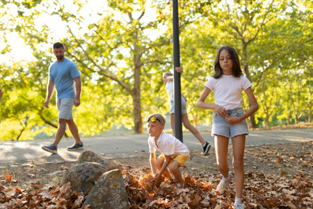 Family enjoying a sunny day in the parkの写真素材