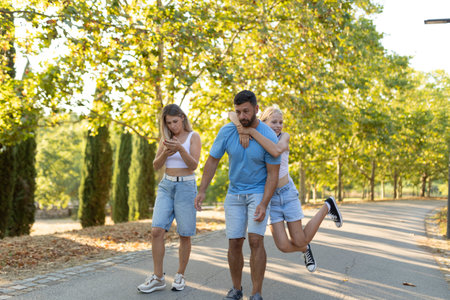 Family enjoying a leisurely walk in natureの写真素材