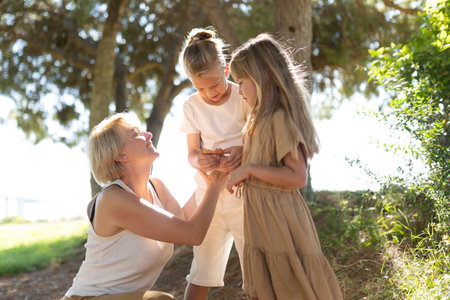 Joyful family moment in a sunlit park