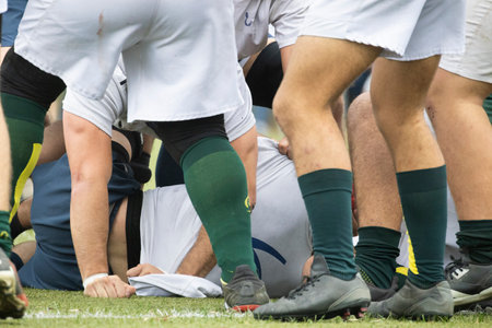 Rugby players competing for the ball during a ruckの写真素材