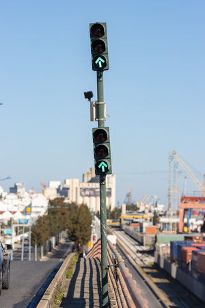Green traffic light pointing forward at the cargo portの写真素材