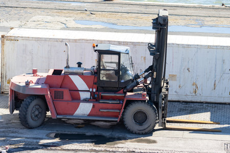 Forklift with empty cab in the shipping portの写真素材