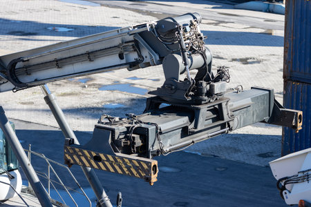 Big cargo spreader for container lifting at the seaportの写真素材