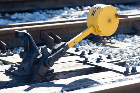 Hand switch lever next to the railwayの写真素材