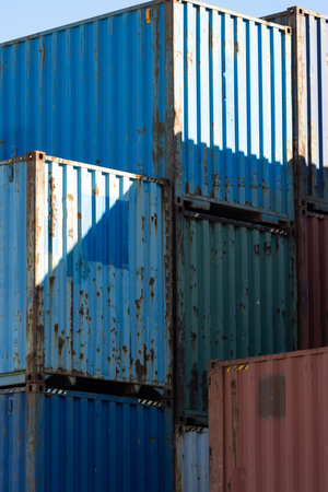 Slightly rusty industrial containers ready for shipping