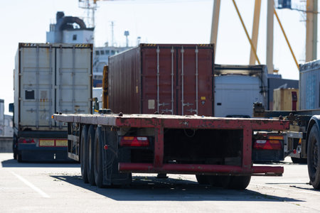 Trucks in the parking lot at the seaport are waiting for loadingの写真素材