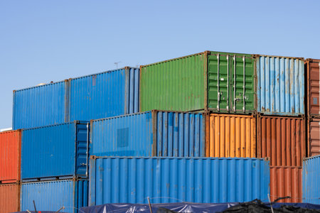 Multicolored cargo containers on a blue sky backgroundの写真素材