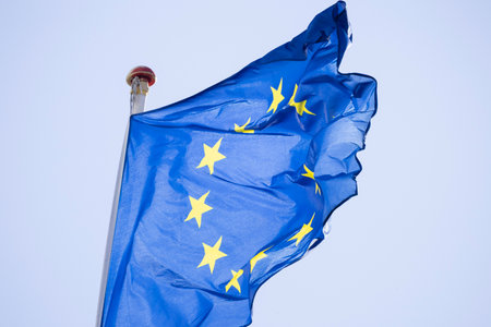 European union flag waving against clear skyの写真素材