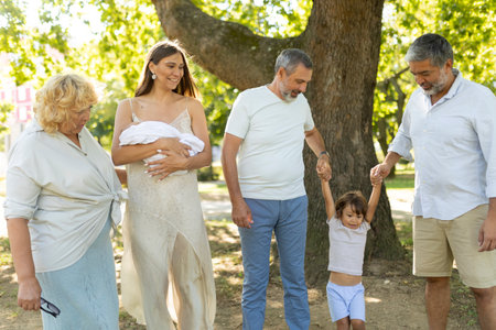 Multi generation family enjoying happy walk in parkの写真素材