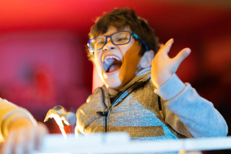 Young child expressing excitement while playing and learning