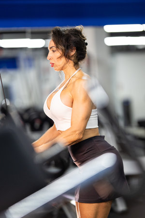 Fit woman training with intensity at gym