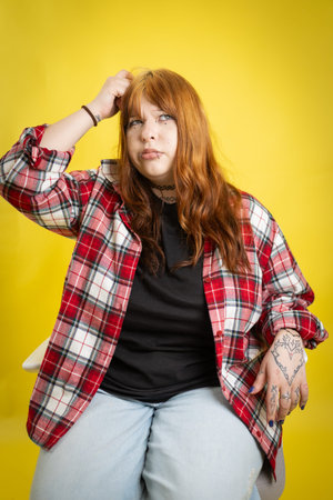Young woman scratching head, thinking and questioning