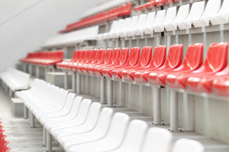 Empty stadium seats awaiting spectators at arena
