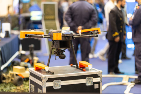 Military drone with camera at defense exhibition event
