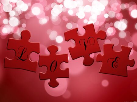 4 red puzzle pieces with the lettering  LOVE  on a bokeh background の写真素材