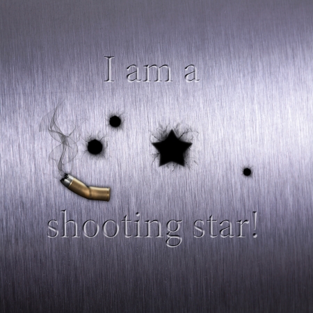 Humorous shot illustration on brushed metal  Bullet holes - one looks like a star - together with a damaged and smoky cartridge case and the text  I am a shooting star   の写真素材