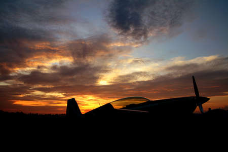 aircraft and background sunsetの写真素材