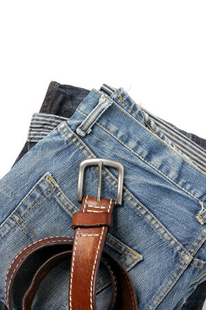 Blue jeans with old brown belt, verticalの写真素材