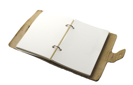Old note book open isolated on white backgroundの写真素材