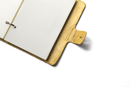 Old note book open isolated on white backgroundの写真素材