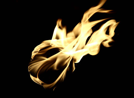Flame Close Up on a Torch Black Backgroundの写真素材