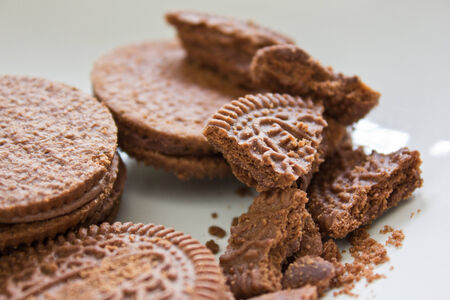 Chocolate chip cookies shot on white colored clothの写真素材