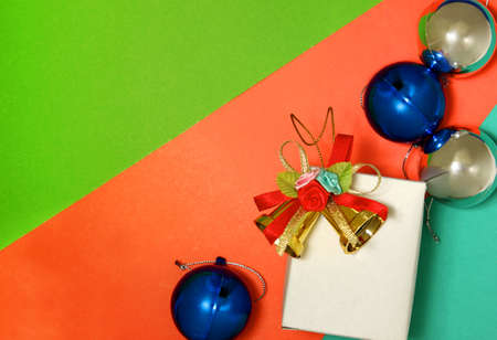 New Year and christmas decoration with white box and two golden bells.