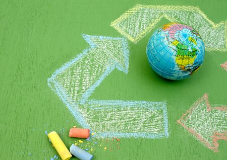 planet ball. Earth day. Green backgroundの写真素材